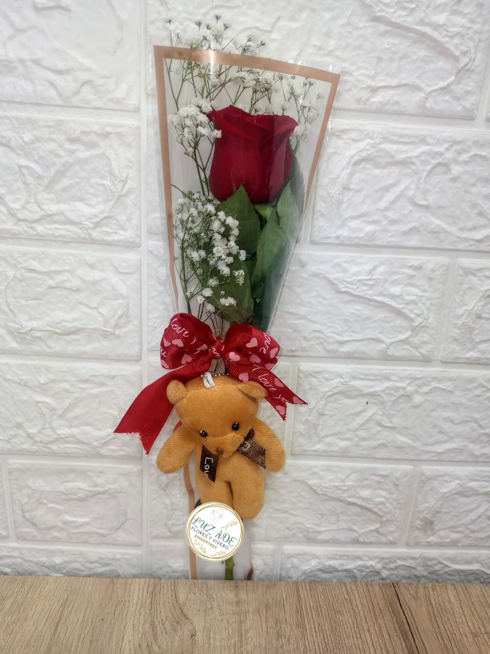 Solitario de rosa con osito